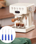 White espresso machine with brown accents brewing coffee, with inset image of 4 blue-handled tools for Silicone E61 Group Head Gasket 8mm. 