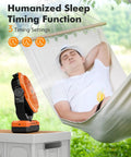 3 In 1 Portable Camping Fan With Light And Power Bank Detachable 36000mAh Battery next to relaxing man in hammock outdoors