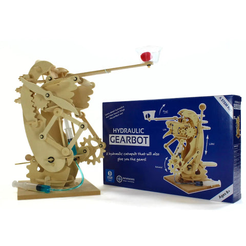 DIY Hydraulic Gearbot Kit: Wooden STEM Build With Gears, Levers And Launcher For Teens And Adults next to product box.