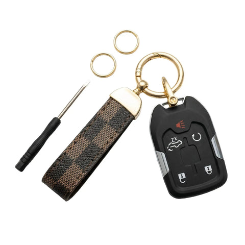 Top Shelf Leather Keychain With Secure Anti Lost D Ring And Heavy Duty Zinc Alloy Clip For Car And Home Keys. Smooth brown checkered leather.