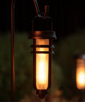 Close-up of Metal Solar Torch Lights With Adjustable Height From 24 To 50 Inches For Outdoor Yard Patio And Garden Pathway Waterproof Tiki Torches