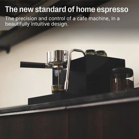Premium Home Espresso Machine Featuring Smart Pressure Profiling And Instant Shot Feedback For Consistent Pulses And Expert Temp Control. A sleek espresso maker brewing on a countertop.