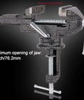 Front view of a 3-inch universal table vise, clamp-on portable bench vise with 360° swivel base, black speckled metal
