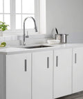 Single Handle Pull-Down Kitchen Faucet With Spot Free Stainless Steel Finish installed in modern kitchen