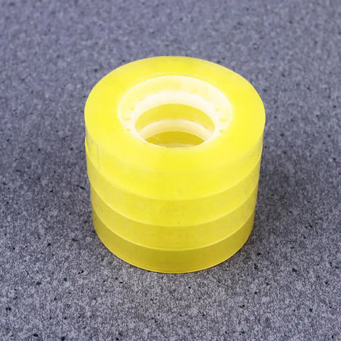 Stack of Dope 12 Pack 11mm X 30m BOPP packing tape for packaging and school use, easy to cut and refill, strong adhesive