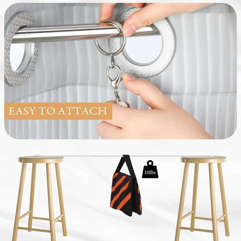 Hands attaching a ring to a silver drapery rod showcasing No Sweat Curtain Pull Wands 46 Inch White Acrylic Drapery Rod Openers.