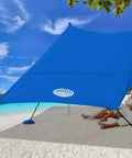 Family Friendly Beach Tent Canopy Sun Shade 10x10 Ft Portable Wind Resistant Shelter with easy setup on sandy beach.