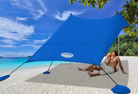 Family Friendly Beach Tent Canopy Sun Shade 10x10 Ft Portable Wind Resistant Shelter with easy setup on sandy beach.