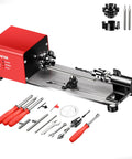 Mini wood lathe front view on a benchtop, red with tailstock, chuck, and turning tool kit
