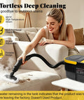 Powerful 2500W Portable Handheld Steam Cleaner With Large Capacity Tank cleaning a couch, highlighting steam and functionality.