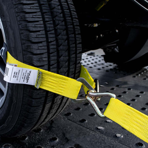 Complete Axle Strap Tie Down Kit With Wire Hook Ratchet Straps In Classic Yellow securing vehicle wheel on trailer