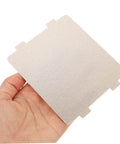 Hand holding a 10Pcs Microwave Oven Mica Sheet, replacement part for heat resistance and insulation, protects microwave from burnout.