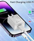 UL Listed 5V 2A USB Wall Charger 2 Pack Fast Charging Plug For iPhone And Apple Watch Travel Ready Go To Compact Block Cube Works Worldwide 100-240V Great For Home Office Or On The Go. White USB wall charger plugged into a phone, compact plastic cube design