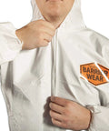 Person zipping Disposable Protective Coveralls Hazmat Suit For Men And Women Lightweight SMMS Microporous Material With Zipper And Elastic Cuffs