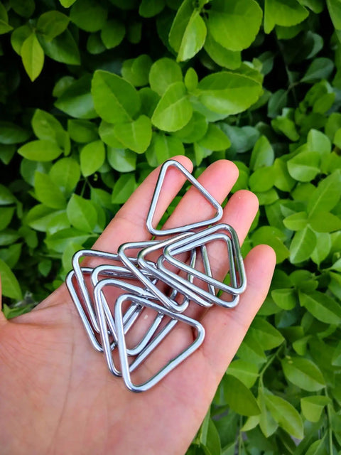 Hand holding Marine Grade Stainless Steel 316 Triangle Ring Buckle Welded V Shaped Ring 1/8 In x 1 3/8 In, 10 Pcs