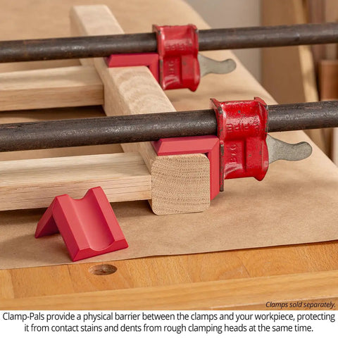 Heavy Duty Woodworking Clamp Pads 12 Pack Shield Boards From Nasty Glue Residue And Dent Marks Universal Fit On Bar And Pipe Clamps used on wooden boards.