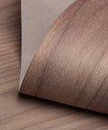 Close-up of Walnut Wood Veneer Sheet 24x48 Flat Cut, Paper Backed 10 Mil, showing A Grade Face, ideal for DIY furniture restoration.