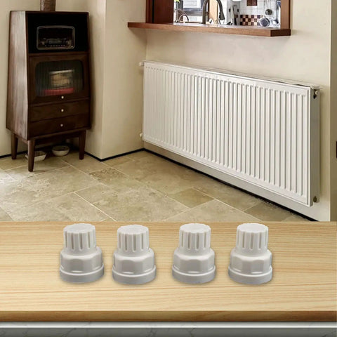Plastic Floor Heating Manifold Handwheel With M30x5 Thread on a table in front of radiator