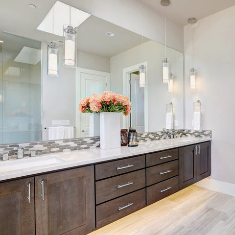 Bathroom vanity with 50 Pack 6 Inch Brushed Stainless Steel Cabinet Pulls with three and three quarters inches center to center spacing.