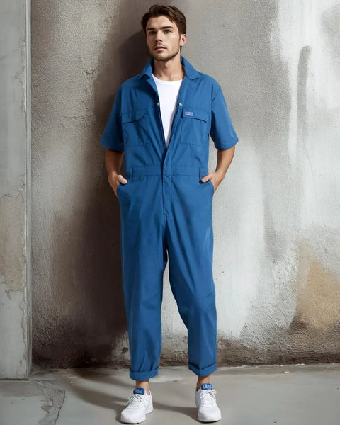 Mens Short Sleeve Coveralls Shop Grade Mechanic Jumpsuit With Deep Utility Pockets Rugged Cotton Poly Blend Built Different For Summer Work Grind Crew Rig Gear on model in blue color.