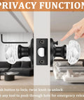 Close-up of Five Pack Glass Door Knobs With Flat Black Rosettes For Privacy showing push pin lock and twist release in living room.