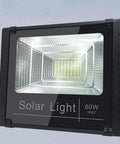 JUDYSSY Solar Flood Lights 60W Solar Outdoor Patio Lighting, close-up of IP67 LED light, ideal for garden and yard illumination.