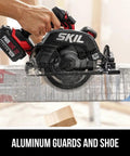 Badass 20V Brushless Cordless Circular Saw Kit With A Full 7 1/4 Inch Blade Spinning Smooth At 5300 RPM Fully Loaded With Heavy Duty Lithium Battery And Lightning Fast Charger Built To Go cutting through wood with aluminum guards.