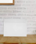 Rigid Self Seal Mailers 100 Pack Cardboard Envelopes Keep Documents Flat Quick Self Seal Bags shown on wooden table
