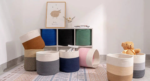 Round 11 Inch Storage Bins Set For Shelves, Durable Woven Cotton Cube Baskets, 3 Pack Green displayed on floor next to storage unit.