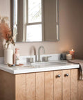 Precept Widespread Bathroom Faucet Brushed Nickel installed on 3-hole sink with towels and decor, ADA compliant WaterSense