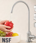 Hand washing an apple under water from KES NSF Certified All Metal Drinking RO Water Faucet Non-Plastic Connector.