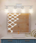 4 Light Brushed Nickel Bathroom Wall Sconce With Clear Glass in modern bathroom over mirror