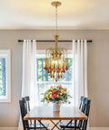 Gold Crystal Pendant Light Fixture For Dining Room And Kitchen Island above dining table with flowers
