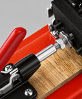 Close-up of the No Bull Adjustable Pen Blank Vise And Square Drill Jig, showcasing its clamp mechanism and MDF safety plate.