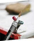 Pro-Grade Seamless Electric Welding Hammer Kit With High-Strength Welding Magnets And Precision Iron Needle on table