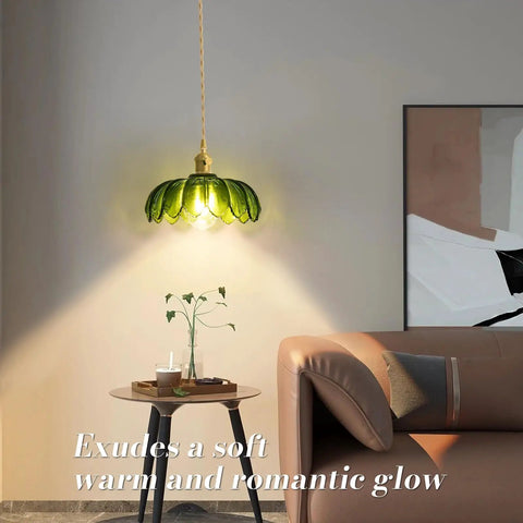 Super Easy Install Green Glass Plug In Pendant Light above a table, with soft glow, in a modern living room setting.