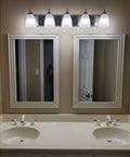 Armada 36 Inch Five Light Modern Vanity Light With Brushed Nickel Finish And Frosted Glass Shades Above Bathroom Mirrors
