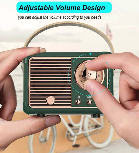 Mini Retro Bluetooth Speaker Portable Wireless Speaker For Home Office Party Outdoor Use Vintage Decor Style Cute Old Fashion Look For iPhone Android Green in hand adjusting volume.