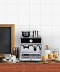 Straight Up Professional Espresso Machine With Built In Grinder And Pid Temp Control To Pour Legit Crema and Swift Shots Using 58Mm Portafilter Plus Hot Steam Wand For Silky Foam On Any Counter on a wooden kitchen counter.