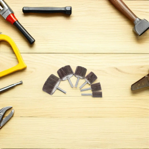 Ditch The Rough Edges With These 12 Assorted Flap Wheel Buffing Sets For Grinding Heads That Crush Deburring Metal And Drill Bits To Polish Complex Shapes Like A Boss, assorted flap wheels on wooden surface.
