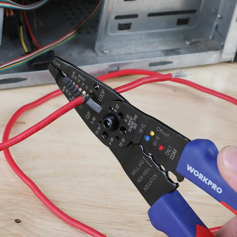 All-In-One 8-Inch Wire Stripper And Multi-Tool Cutter in use, cutting a red wire, showcasing pliers nose and induction hardened edge.