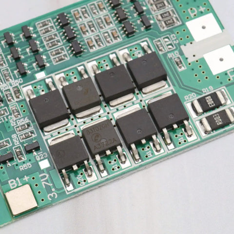 Close-up of Straight Up Badass 3S 40A Protection Board For 12V Lithium Battery Packs showing components and circuits.