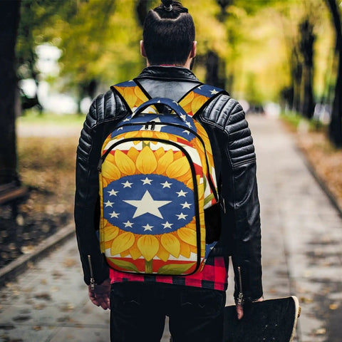 American Sunflower Flag Printed Unisex Backpack with large capacity and padded straps worn by person outdoors