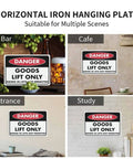 Horizontal iron hanging danger sign in bar, cafe, entrance, and study; goods lift only; riding not permitted.