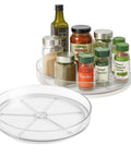 Clear Two Pack Rotating Lazy Susan Organizers With 9 And 10 Inch Countertop Turntables For Kitchen Cabinets Pantry Spice Racks making pantry storage slick and a total breeze on your counters, featuring spice jars.