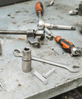 Heavy Duty Steel Clevis Pin Kit M10x35mm With Flat Head And Single Hole 3 Pairs Hitch Pin Set For Hydraulics Jacks And Equipment Built Tough To Take Repeated Wear And Last Long On Any Rig, shown with metal pins on workbench