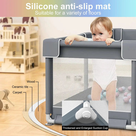 Toddler in Monster Sized 71 By 59 Inch Baby Playpen For Toddlers Indoor Outdoor with gate, showing anti-slip base on wood floor.