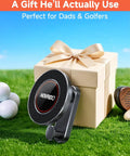 Heavy Duty Magnetic Golf Cart Phone Mount With Cup Hook displayed beside a gift box on grass, ideal for golfers.
