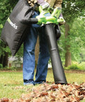 Person using 40V Cordless Brushless Leaf Blower Vacuum 185 MPH 340 CFM 2 In 1 Quick Switch With Bag for yard cleanup