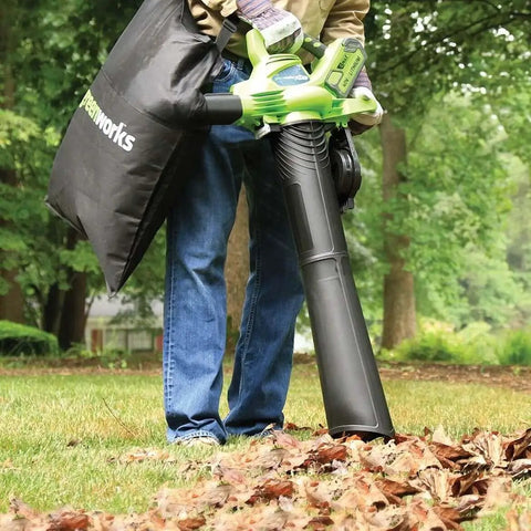 Person using 40V Cordless Brushless Leaf Blower Vacuum 185 MPH 340 CFM 2 In 1 Quick Switch With Bag for yard cleanup
